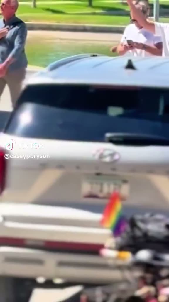 Crowd Arrival Clip: A Public Figure Walking a Vehicle Line